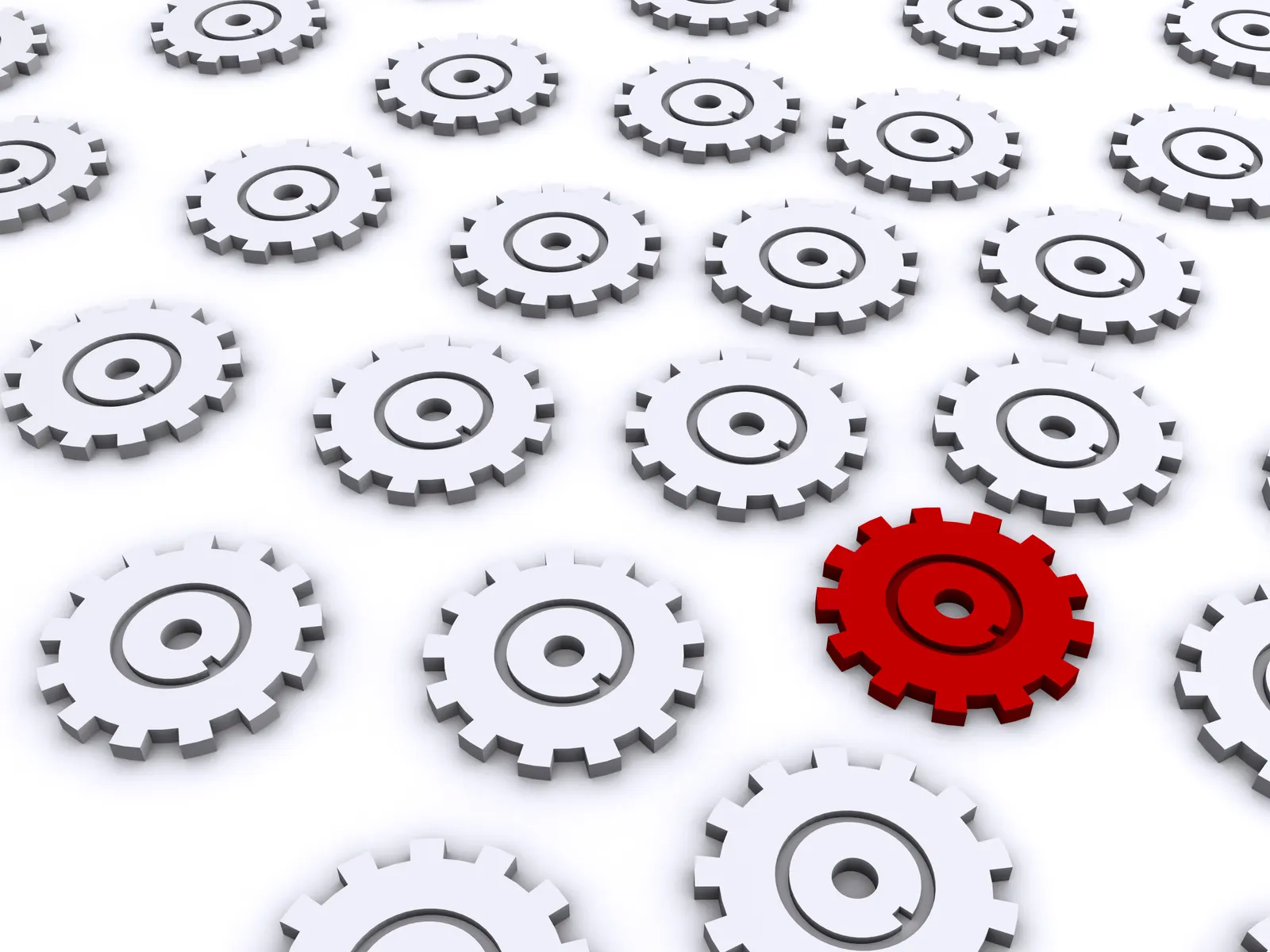 One red 3D gear among many white gears on a white surface