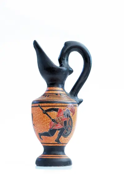 Black and orange Greek-style ceramic jug painted with a running warrior on white