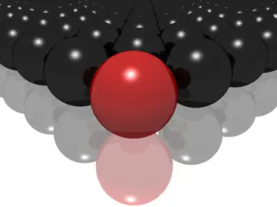 Single red sphere in front of rows of glossy black spheres in a 3D render