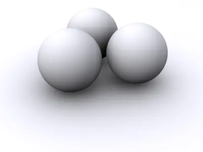 Three white 3D spheres grouped together on a white background with soft shadows
